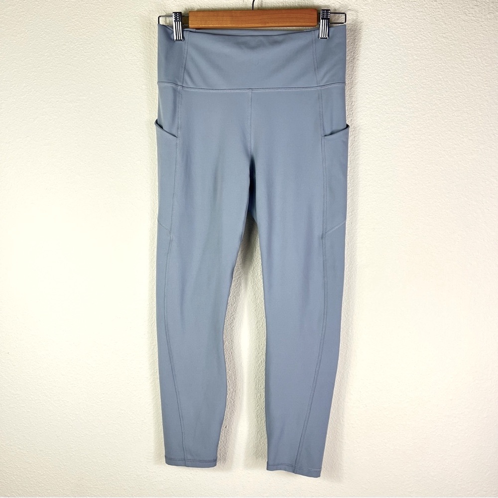 Fabletics PureLuxe Women’s Medium Leggings in Light Blue side pockets 22” inseam